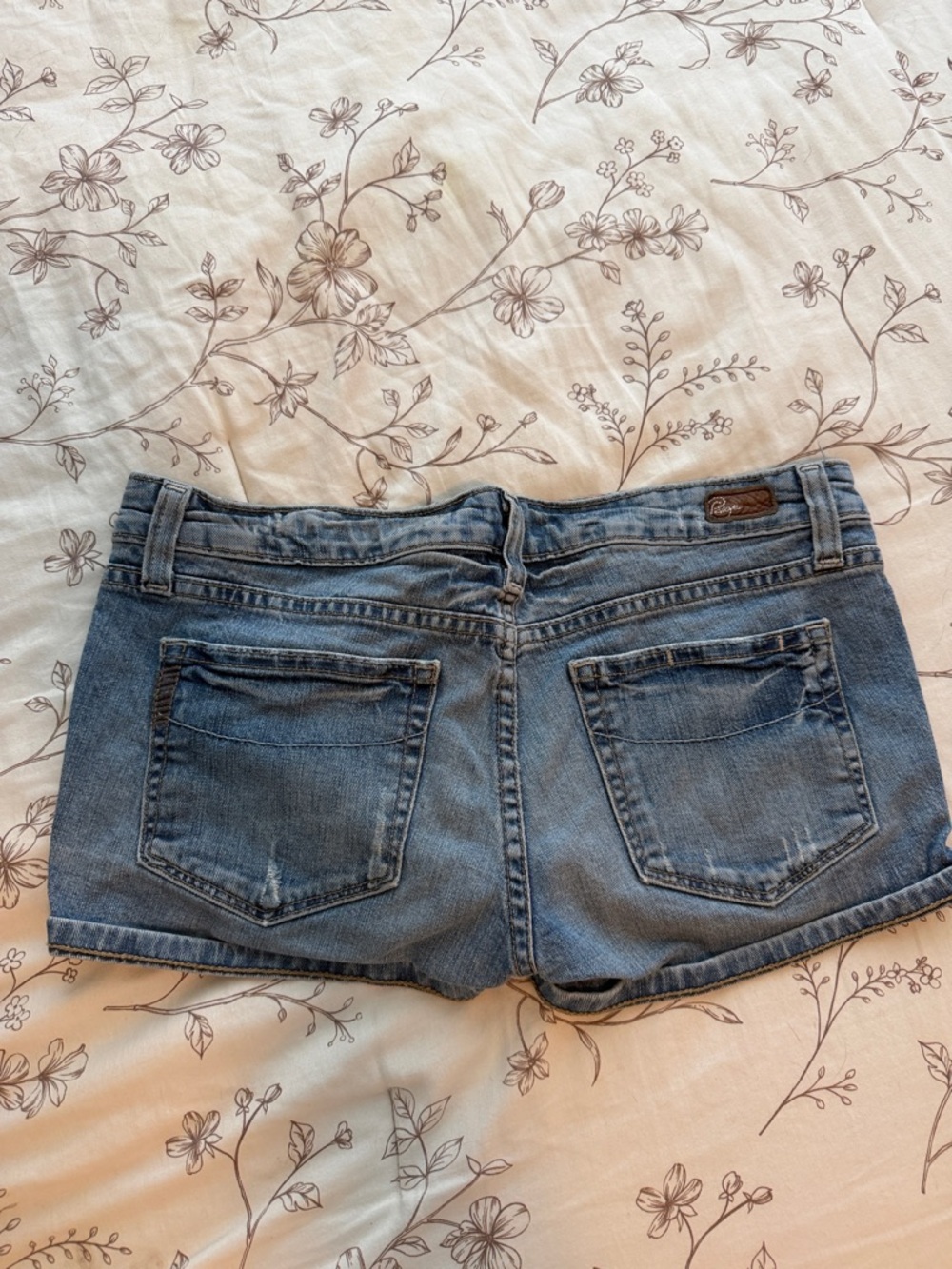 PAIGE Light Blue Denim Cutoff Shorts